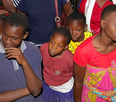 Children and young people seated together